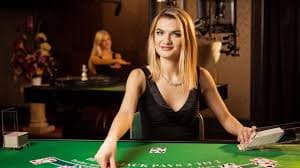 Ilustrasi meja permainan live casino dengan dealer asli di vox88